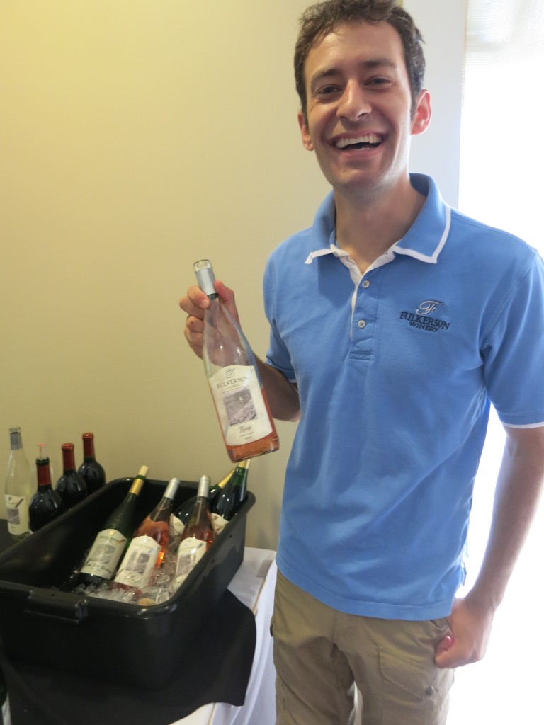 The personable Steven Fulkerson, holding a bottle of his bright and fruity Pinot Noir/Dornfelder rosé